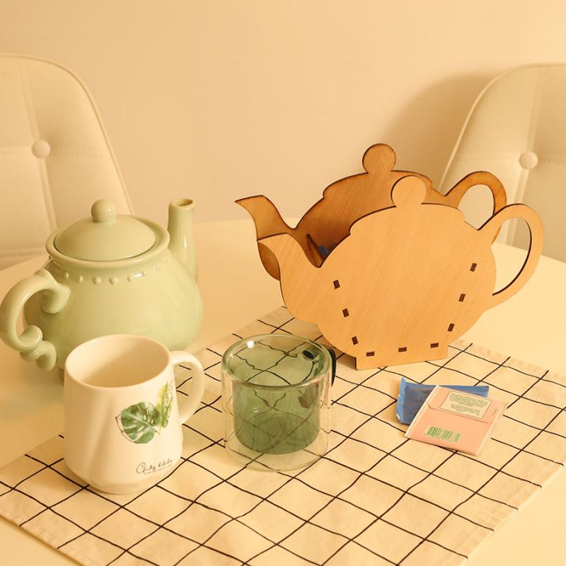 Caja para tés con forma de tetera